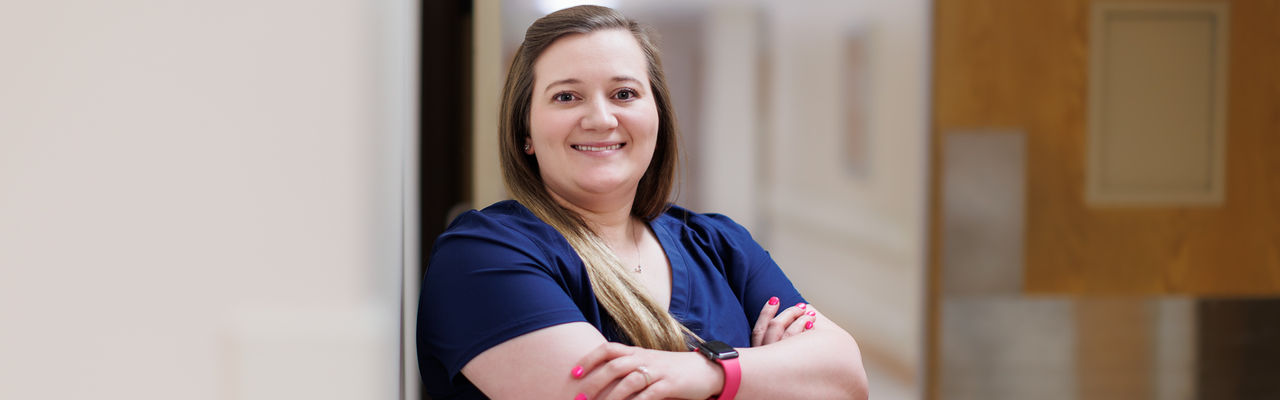 bolivar smiling nursing with crossed arms